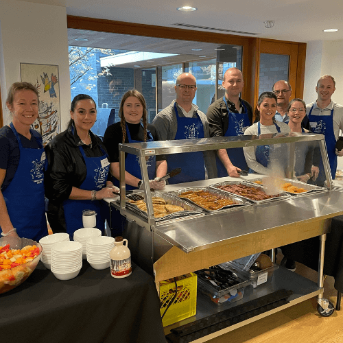 Leadership Team Making Meals